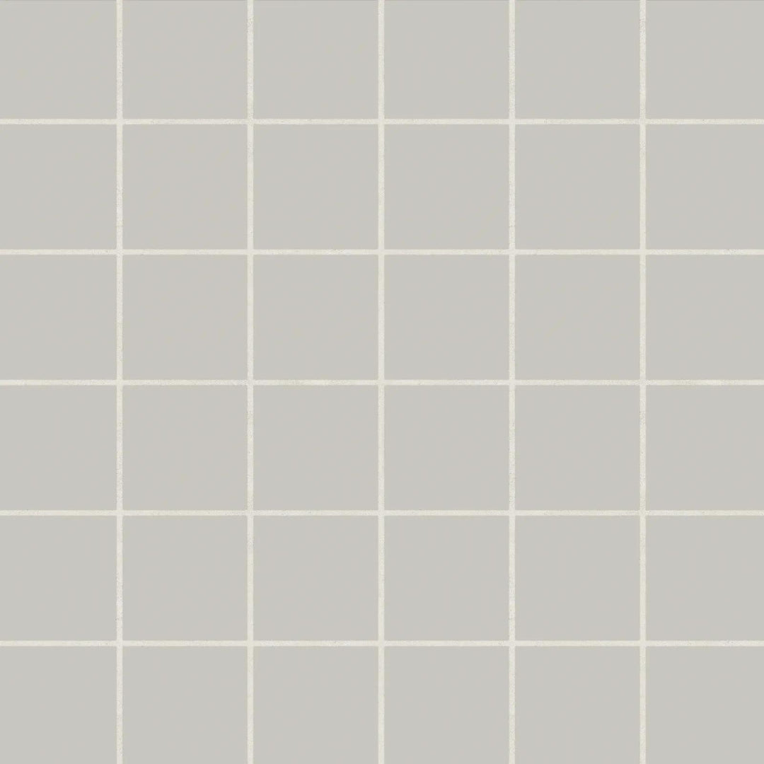 Aerial shot of Marin Pebble Gray 2" Square Matte Glazed Porcelain Mosaic, presenting soft gray tones in a contemporary square grid with a matte glaze.