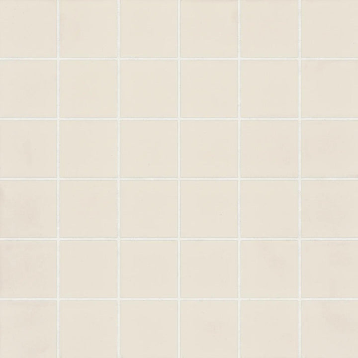 Top-down view of Marin Sand Dollar 2" Square Matte Glazed Porcelain Mosaic, capturing warm neutral hues in a timeless square design with a smooth matte finish.