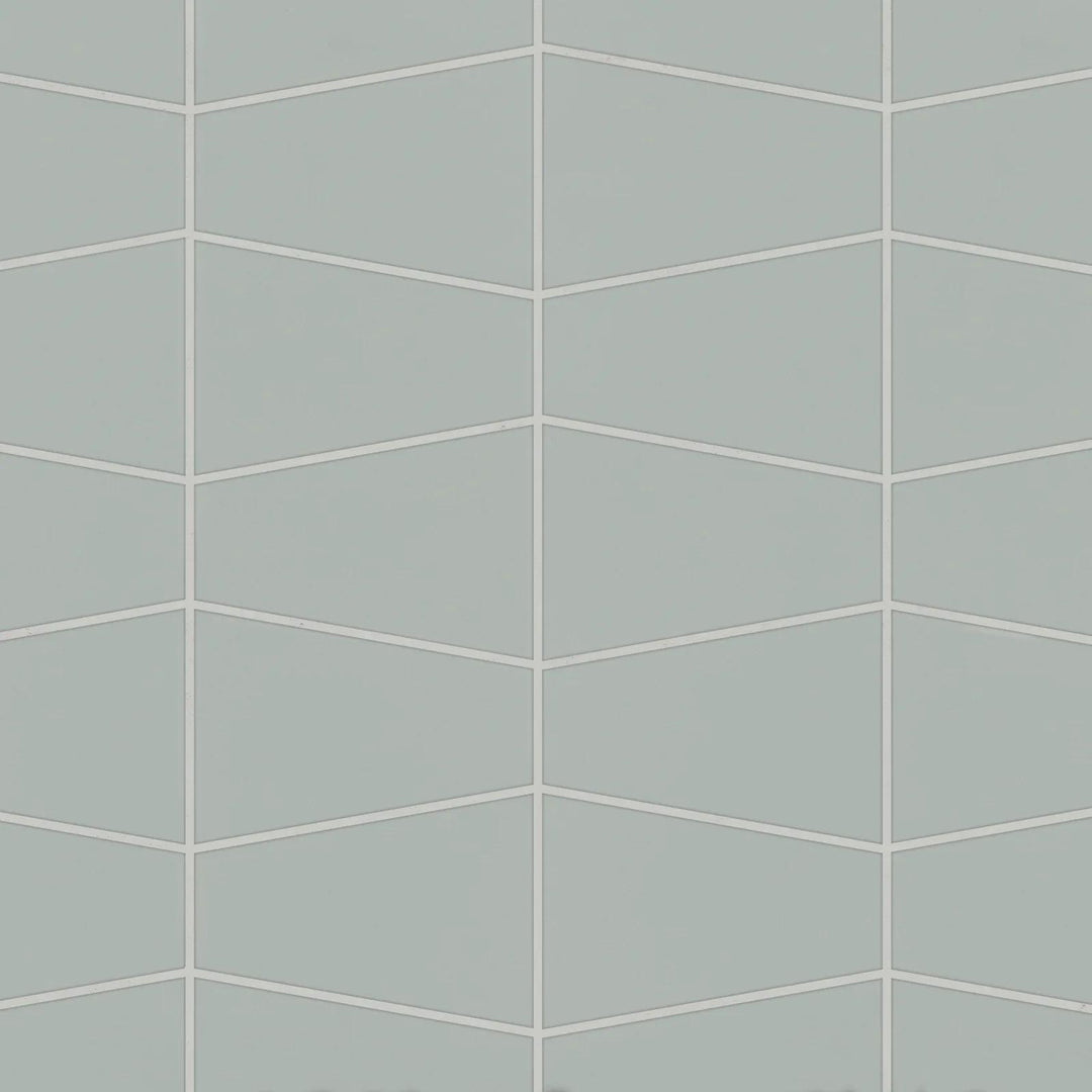 Overhead shot of Marin Aloe Green Trapezoid Matte Glazed Porcelain Mosaic, featuring an eye-catching trapezoid pattern in a fresh green shade with a matte surface.