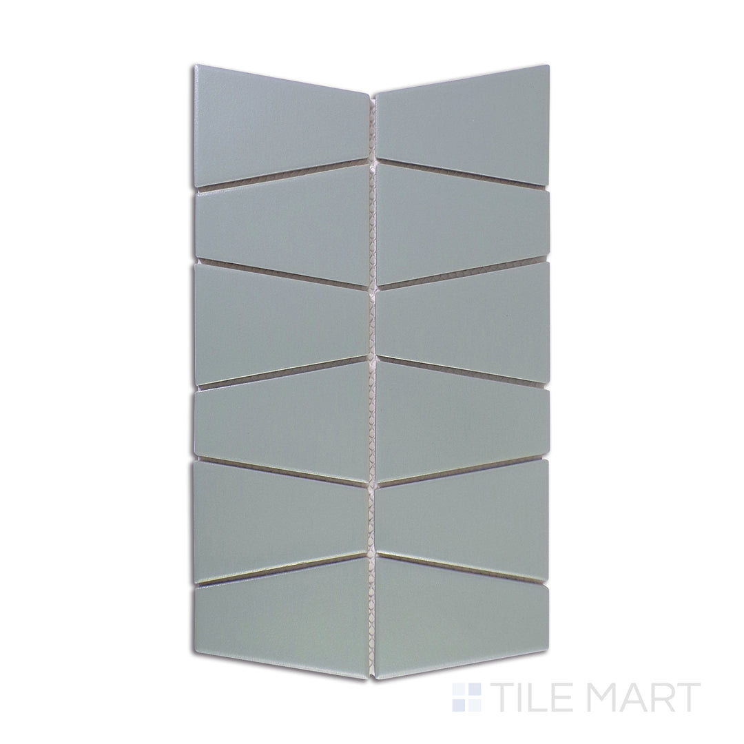 A precise close-up shot of Marin Aloe Green Trapezoid Matte Glazed Porcelain Mosaic highlights its organic green tones and modern trapezoid shape, perfect for contemporary designs.