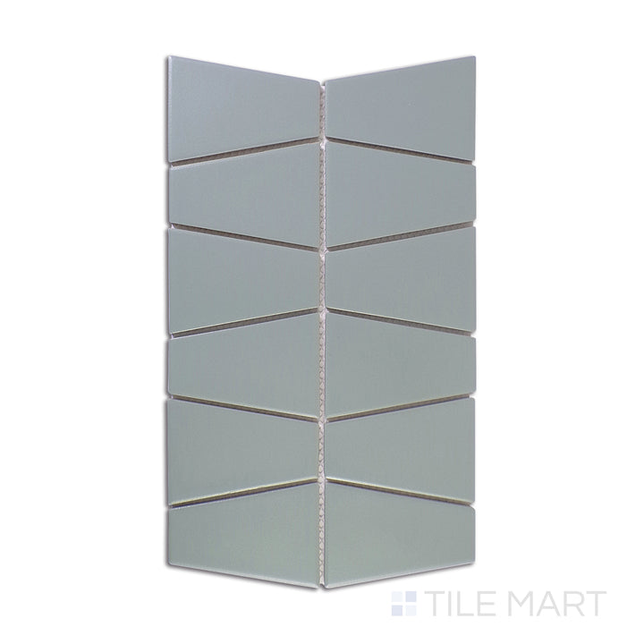 A precise close-up shot of Marin Aloe Green Trapezoid Matte Glazed Porcelain Mosaic highlights its organic green tones and modern trapezoid shape, perfect for contemporary designs.