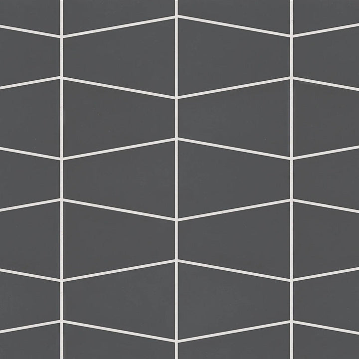 Flat lay of Marin Black Sea Trapezoid Matte Glazed Porcelain Mosaic, showcasing deep black tones in a unique trapezoid layout with a smooth matte texture.