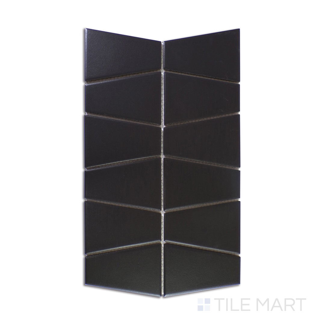 A highly detailed close-up of Marin Black Sea Trapezoid Matte Glazed Porcelain Mosaic showcases its rich black hues with a soft matte finish, adding bold elegance to any space.