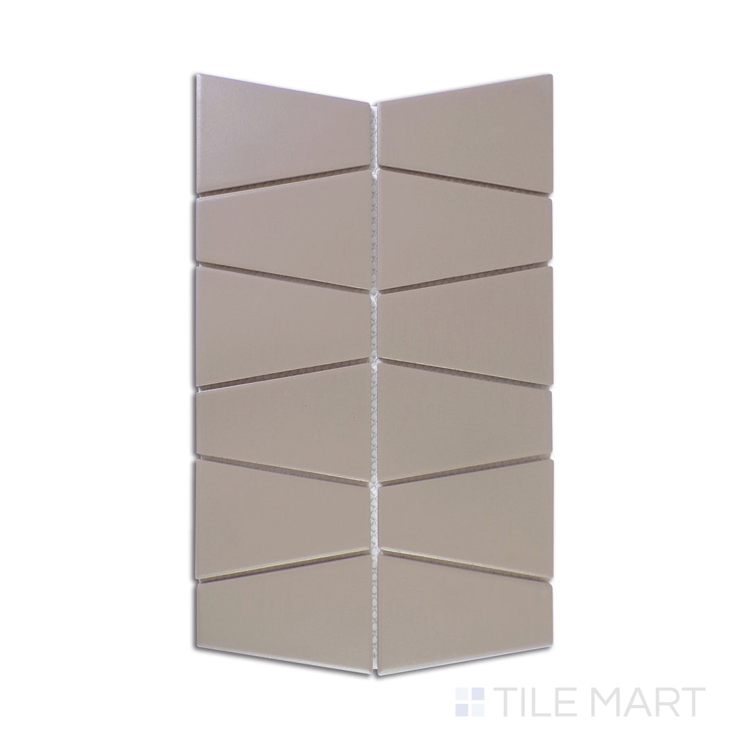 A finely captured close-up of Marin Coastal Cliff Trapezoid Matte Glazed Porcelain Mosaic reveals its subtle gray undertones and sophisticated matte texture, ideal for modern aesthetics.