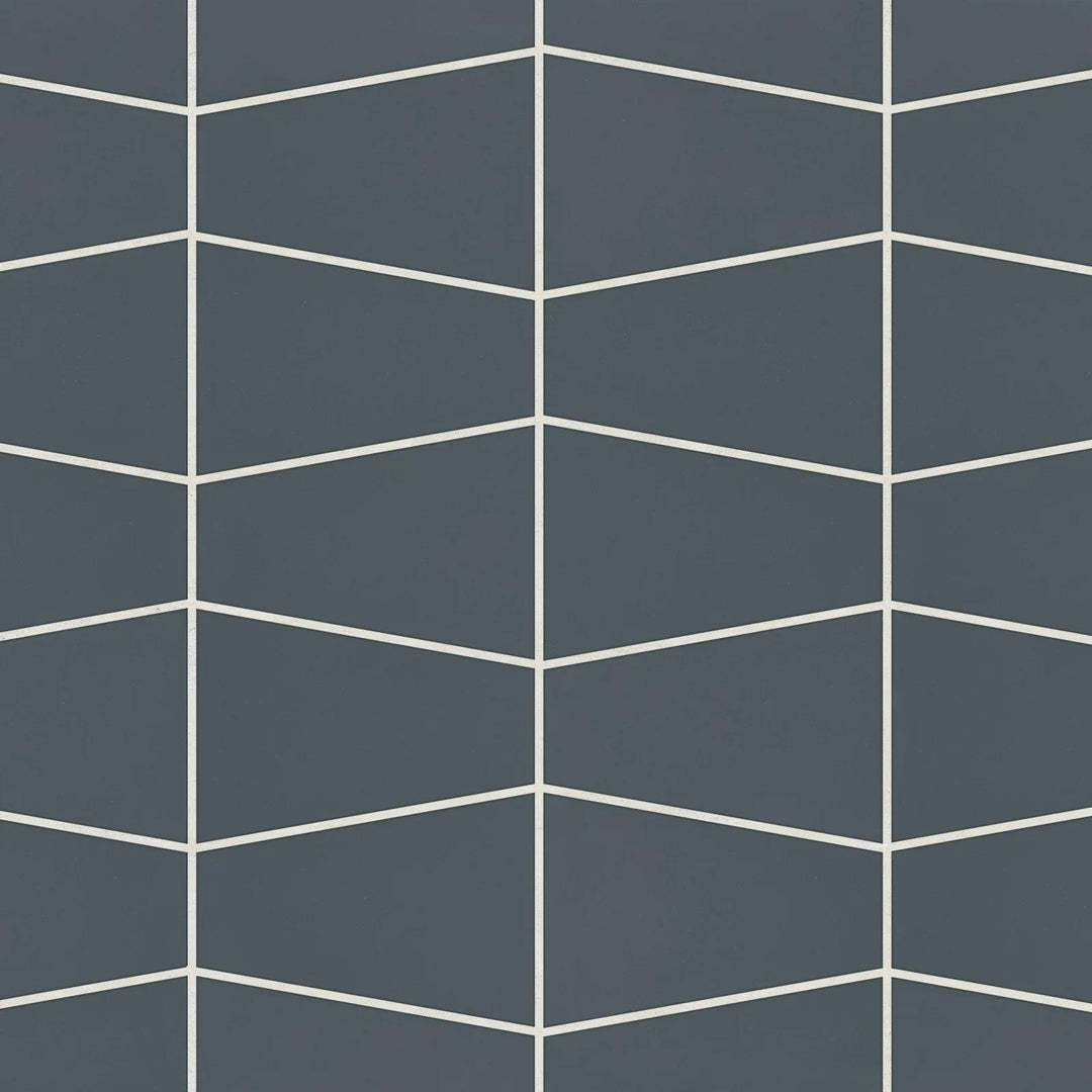 Top-down perspective of Marin Midnight Tide Trapezoid Matte Glazed Porcelain Mosaic, displaying rich navy blue hues with a contemporary trapezoid shape and a matte coating.