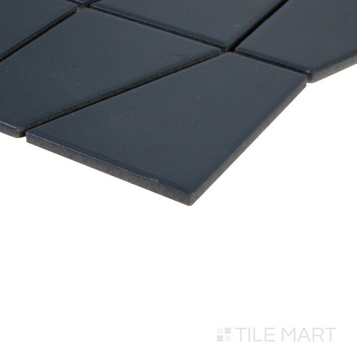 Corner-focused image of Marin Midnight Tide trapezoid matte glazed porcelain mosaic, emphasizing its rich navy shade, non-reflective matte finish, and structured edge formation.