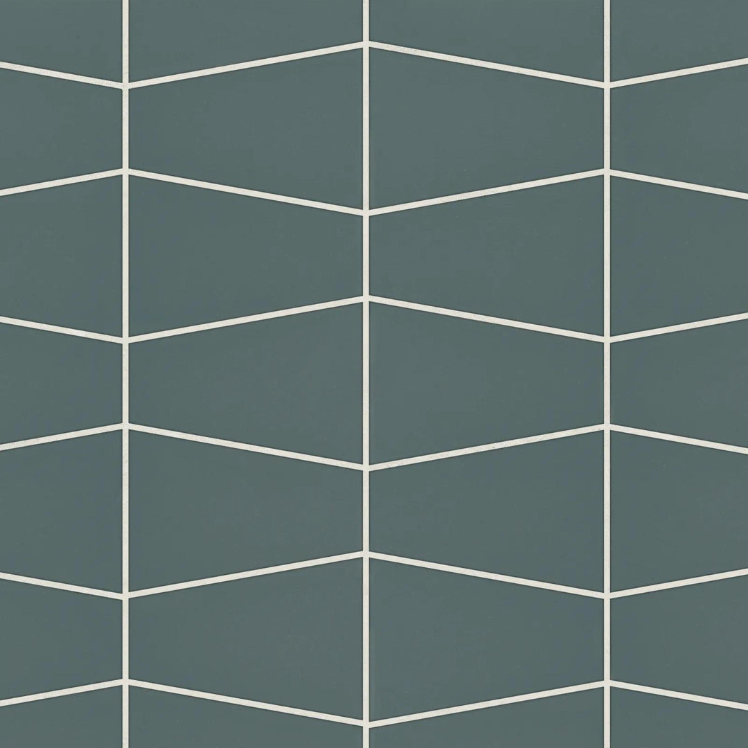 Flat lay of Marin Ocean Teal Trapezoid Matte Glazed Porcelain Mosaic, featuring vibrant teal hues with a unique geometric trapezoid pattern and a refined matte finish.