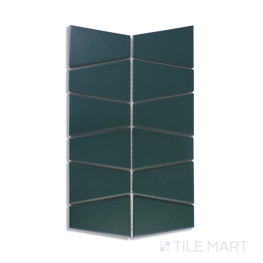 A sharply detailed close-up of Marin Ocean Teal Trapezoid Matte Glazed Porcelain Mosaic highlights its bold teal hues with a matte finish, perfect for adding depth to any setting.
