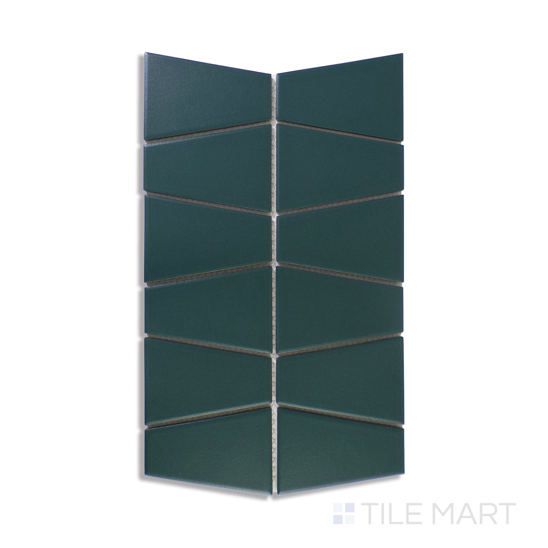 A sharply detailed close-up of Marin Ocean Teal Trapezoid Matte Glazed Porcelain Mosaic highlights its bold teal hues with a matte finish, perfect for adding depth to any setting.
