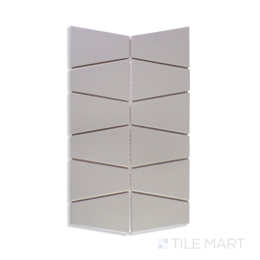 A zoomed-in shot of Marin Pebble Gray Trapezoid Matte Glazed Porcelain Mosaic captures its neutral gray shade and soft matte surface, bringing a sleek, contemporary touch to interiors.