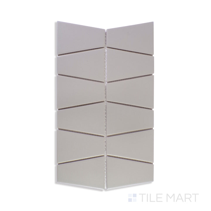 A zoomed-in shot of Marin Pebble Gray Trapezoid Matte Glazed Porcelain Mosaic captures its neutral gray shade and soft matte surface, bringing a sleek, contemporary touch to interiors.