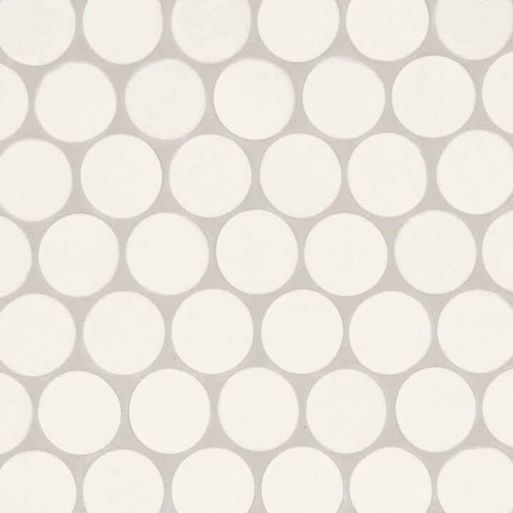 Flat lay of Makoto Shoji White 2" Round Matte Porcelain Mosaic, presenting a crisp white surface with a modern matte finish in a circular arrangement.