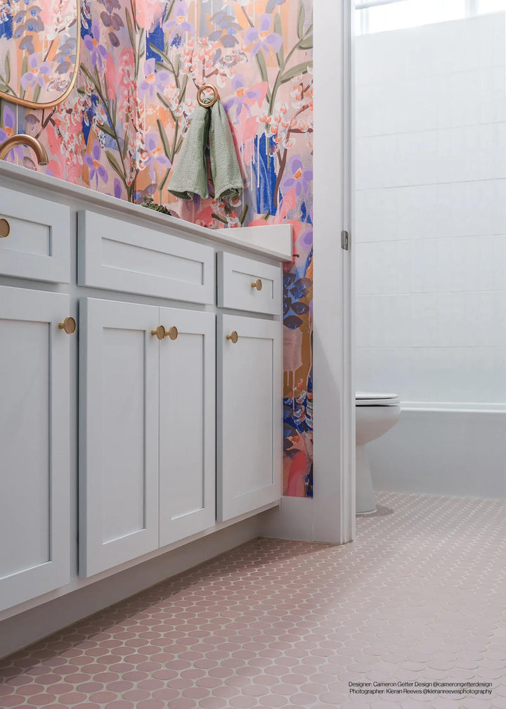 Makoto Momoiro Blush 2" round matte porcelain mosaic brings a delicate and inviting warmth, softening spaces with its subtle, rosy hue.