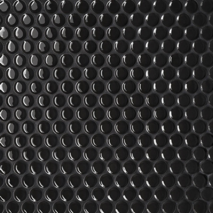 Flat lay of Le Café Black 3/4" Penny Round Gloss Porcelain Mosaic, showcasing deep black tones with a glossy finish in a traditional penny round pattern.