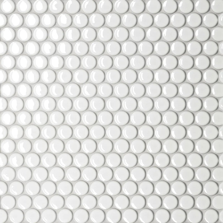 Aerial shot of Le Café White 3/4" Penny Round Gloss Porcelain Mosaic, emphasizing pure white shades with a reflective glossy surface.