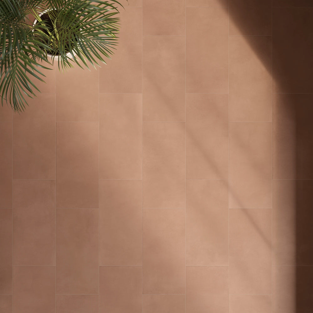 Sahara Cotto Matte Porcelain featured in a styled setting, highlighting its warm earthy tone and natural modern appeal.