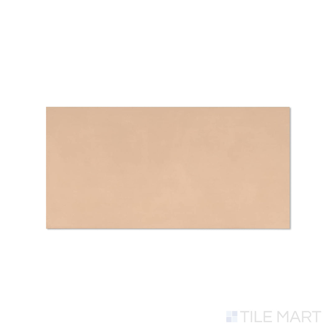Flat lay image of Sahara Rose 12x24 matte porcelain tile featuring subtle rosy beige hues and a soft matte surface.
