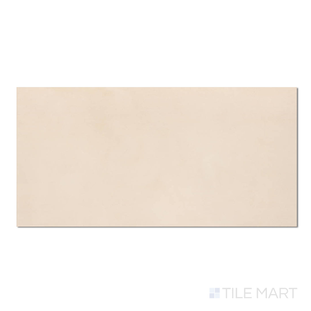 Overhead view of Sahara White 12x24 matte porcelain tile, offering a clean, bright finish with a smooth stone-like appearance.