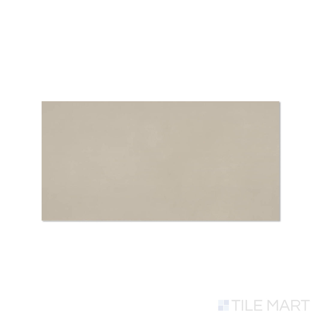 Sahara Grey 12x24 matte porcelain tile in a top-down perspective, displaying cool gray shades and subtle surface movement.