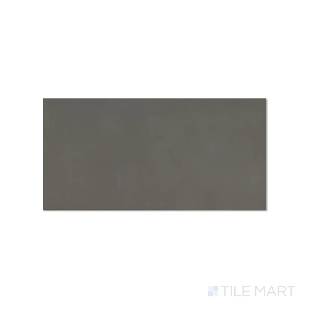 Top-down view of Sahara Dark 12x24 matte porcelain tile, revealing deep charcoal tones with a modern matte finish.