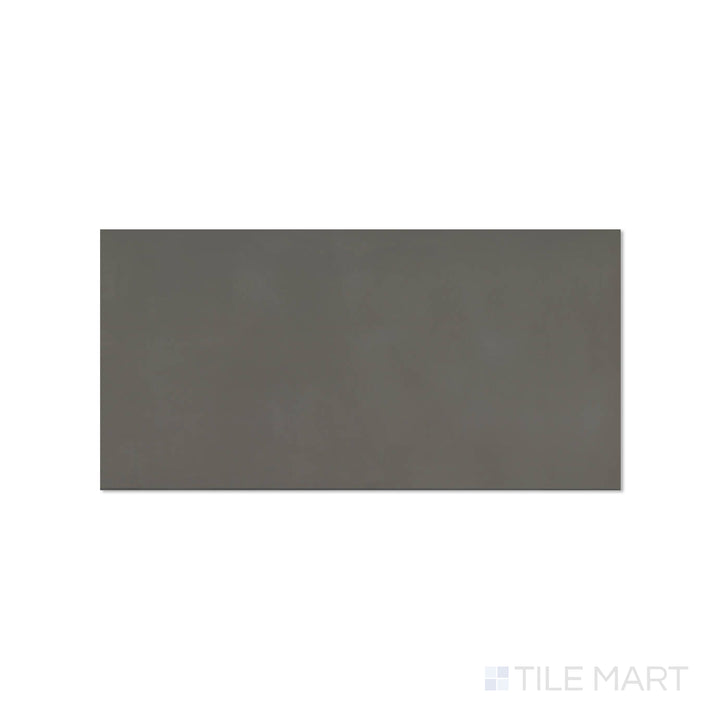 Top-down view of Sahara Dark 12x24 matte porcelain tile, revealing deep charcoal tones with a modern matte finish.
