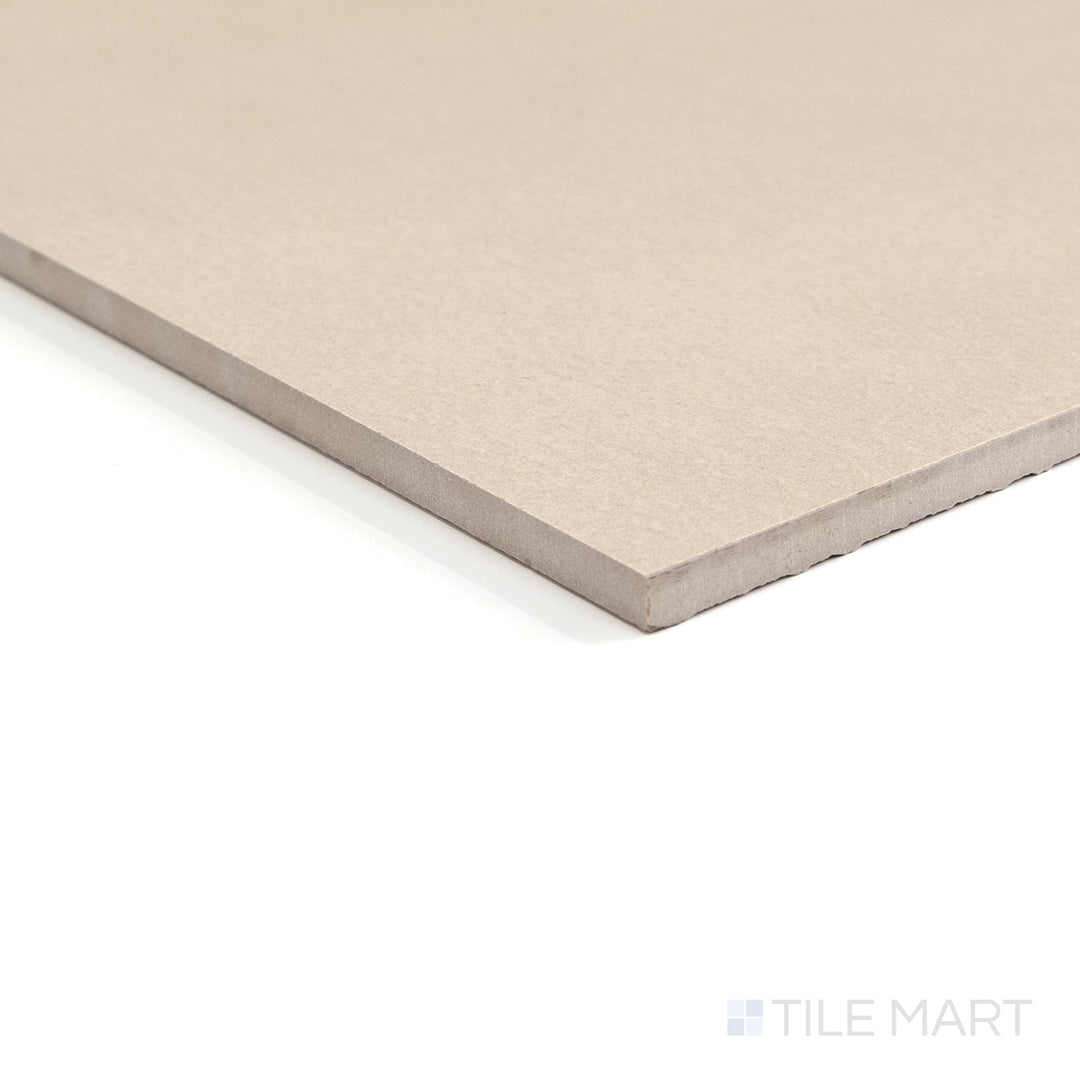 Clean and calm, Sahara Ecru’s neutral tones appear softly in this corner composition.