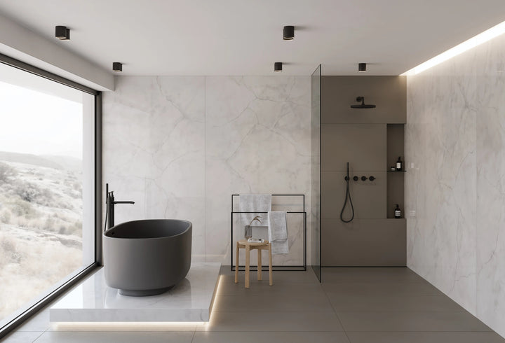 With bold, deep tones, Sahara Dark 24x48 matte porcelain tile adds dramatic contrast in a modern setting.