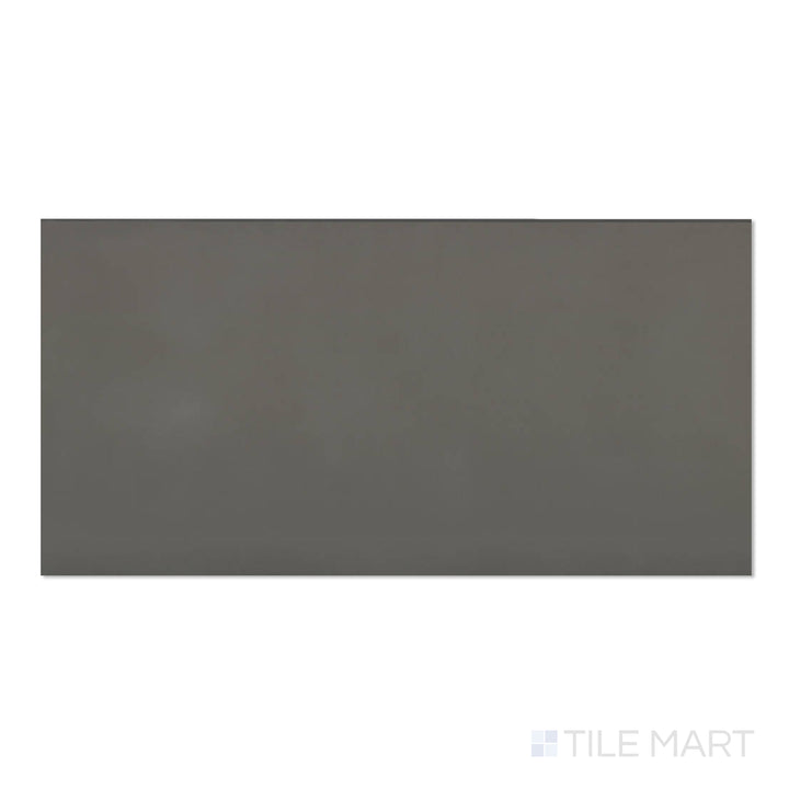 Top-down image of Sahara Dark 24x48 matte porcelain tile, highlighting deep charcoal hues with a natural stone look.