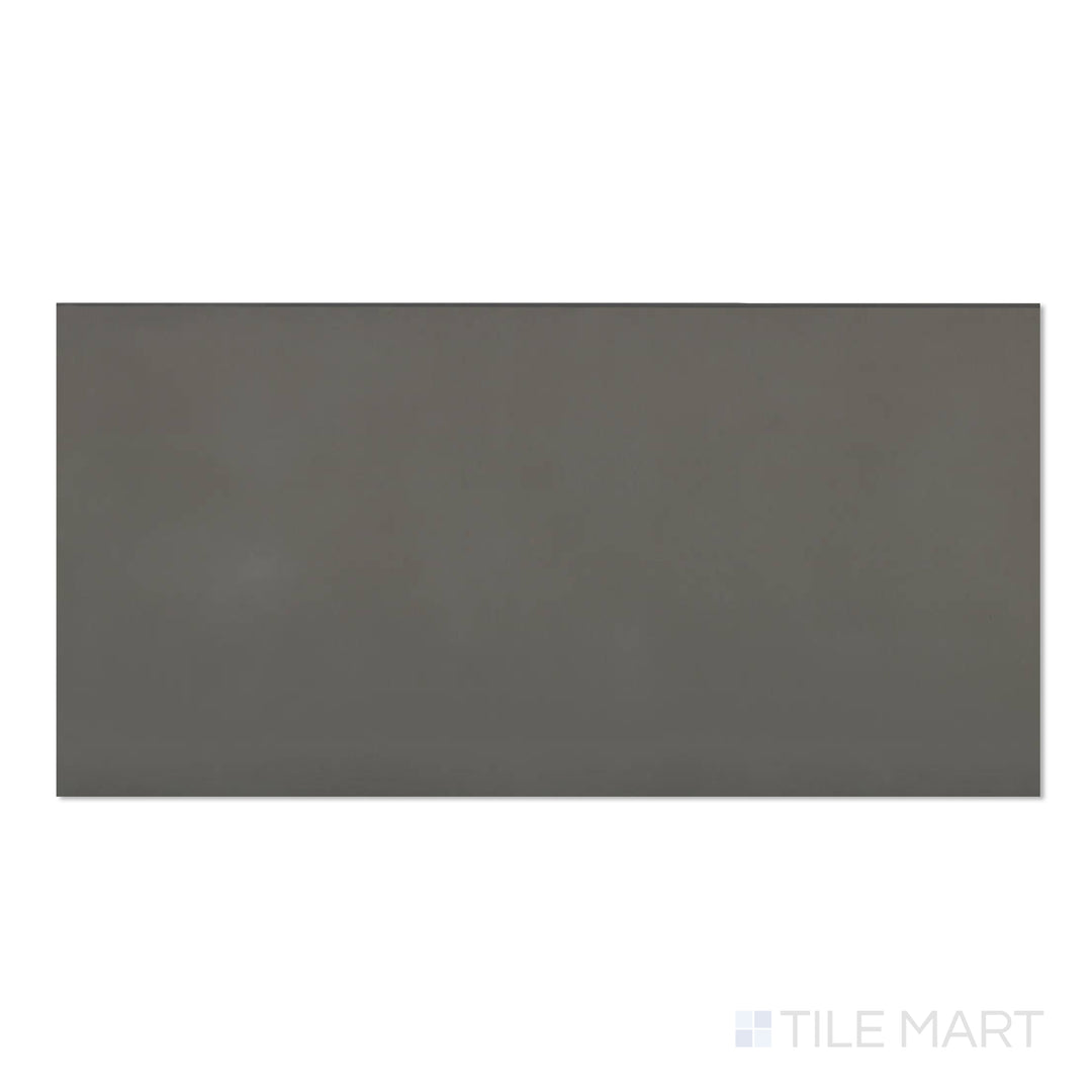 Top-down image of Sahara Dark 24x48 matte porcelain tile, highlighting deep charcoal hues with a natural stone look.