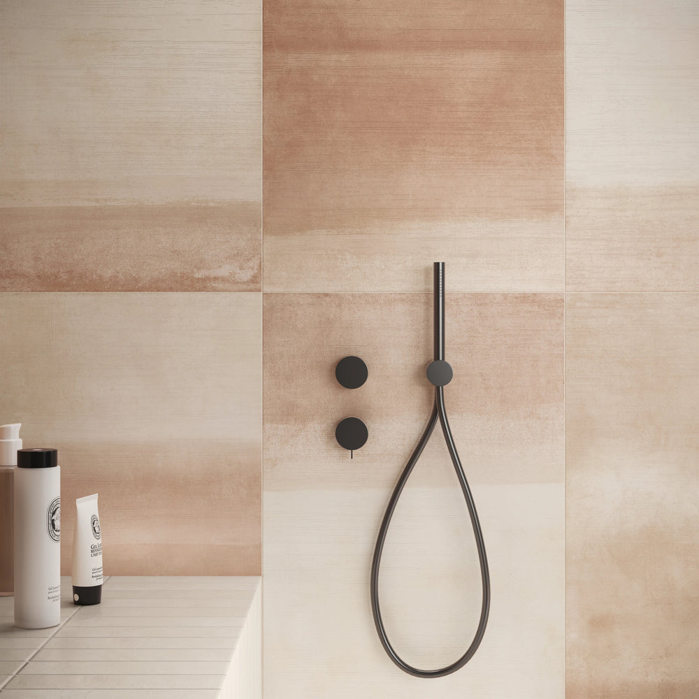Sahara Warm Deco Matte Porcelain displayed in a styled scene, emphasizing its soft warmth and subtle decorative finish.