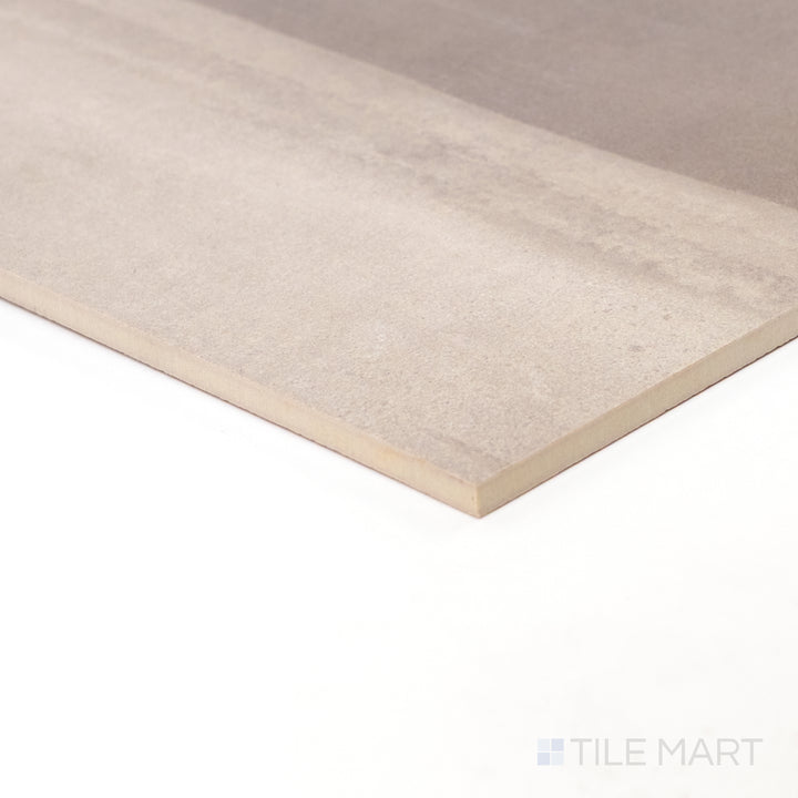 Corner view showing the matte surface and subtle decorative texture of Sahara Cold porcelain tile.