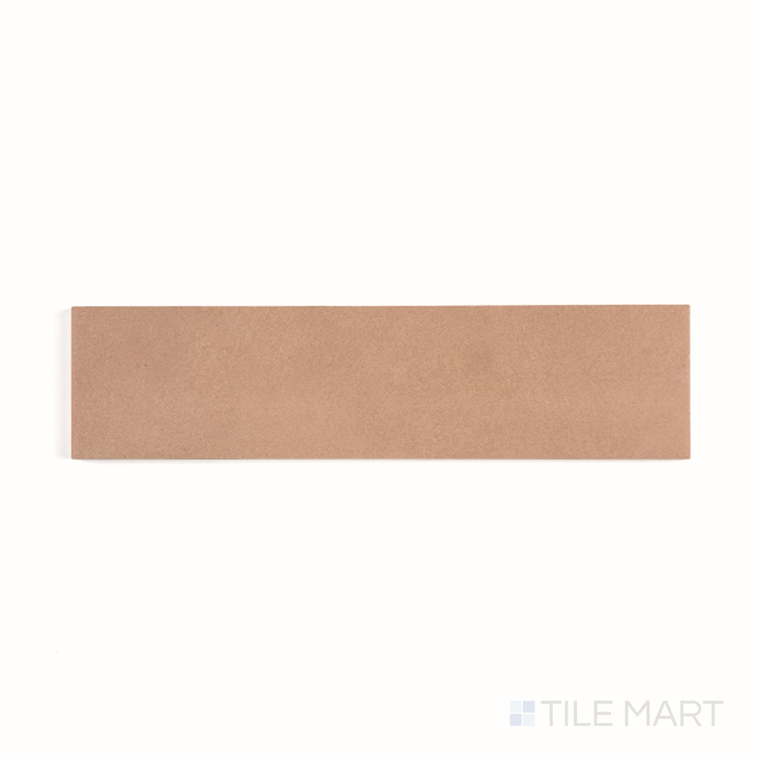Top-down view of Sahara Cotto 3x12 matte porcelain tile, revealing earthy terracotta tones and subtle stone-like texture.