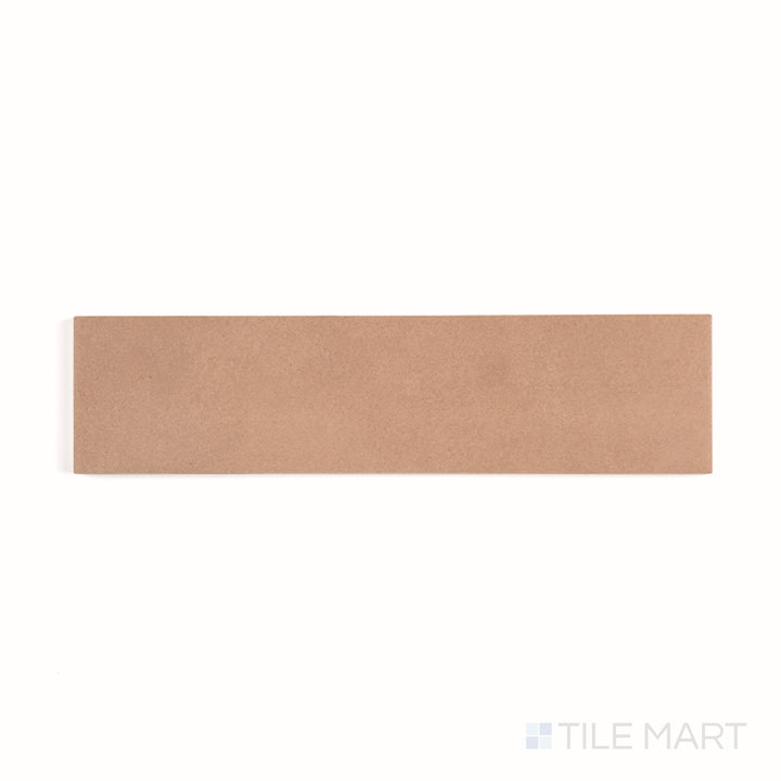 Top-down view of Sahara Cotto 3x12 matte porcelain tile, revealing earthy terracotta tones and subtle stone-like texture.