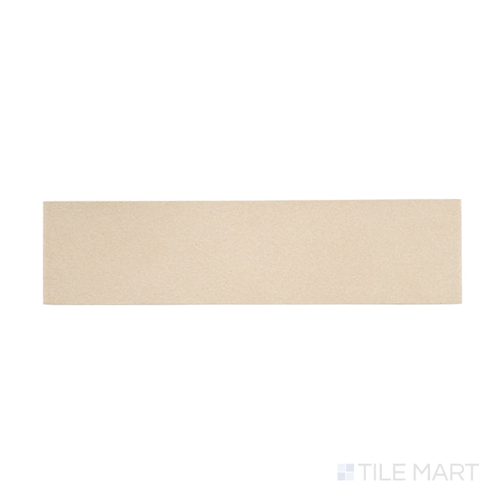 Flat lay of Sahara Ecru 3x12 matte porcelain tile, emphasizing warm neutral shades with a smooth matte finish.