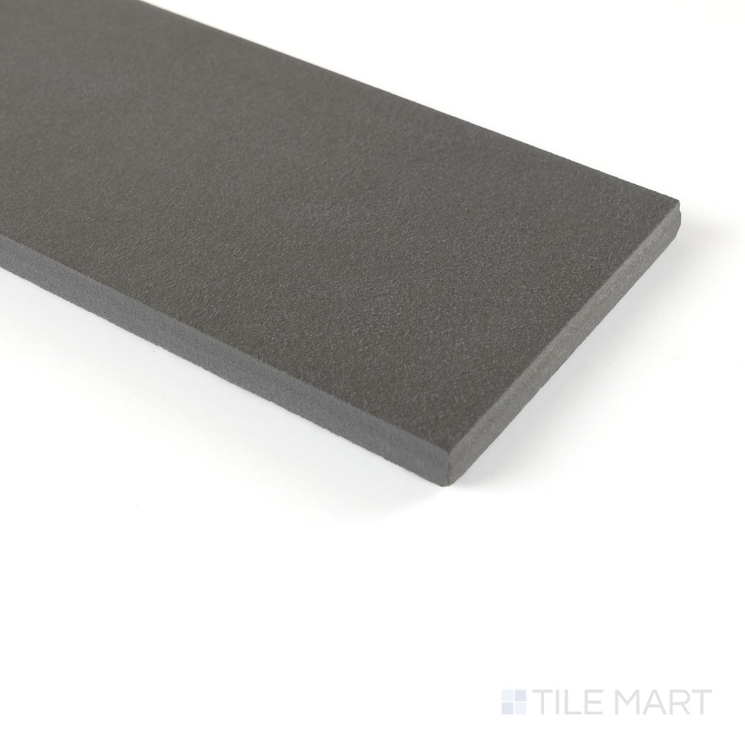 Corner perspective of Sahara Dark matte porcelain tile emphasizing its deep tone and sophisticated matte surface.