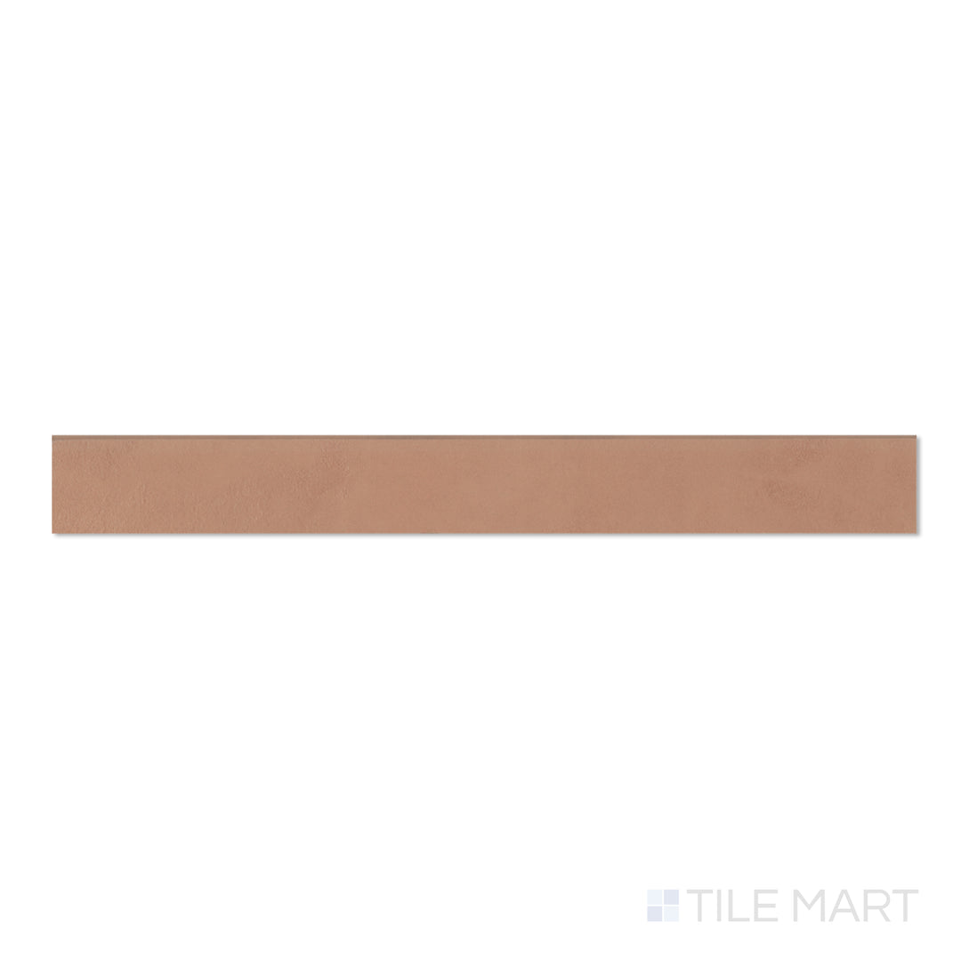 Top-down view of Sahara Cotto 3x24 matte porcelain bullnose tile, showing terracotta tones and a smooth rounded edge.