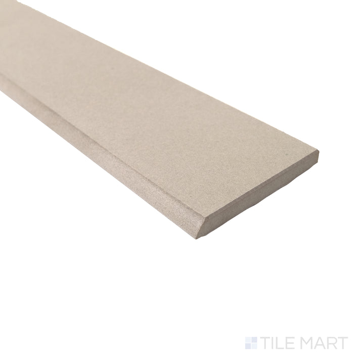 Close-up of Sahara Ecru matte porcelain bullnose tile featuring its creamy tone and clean finished edge.