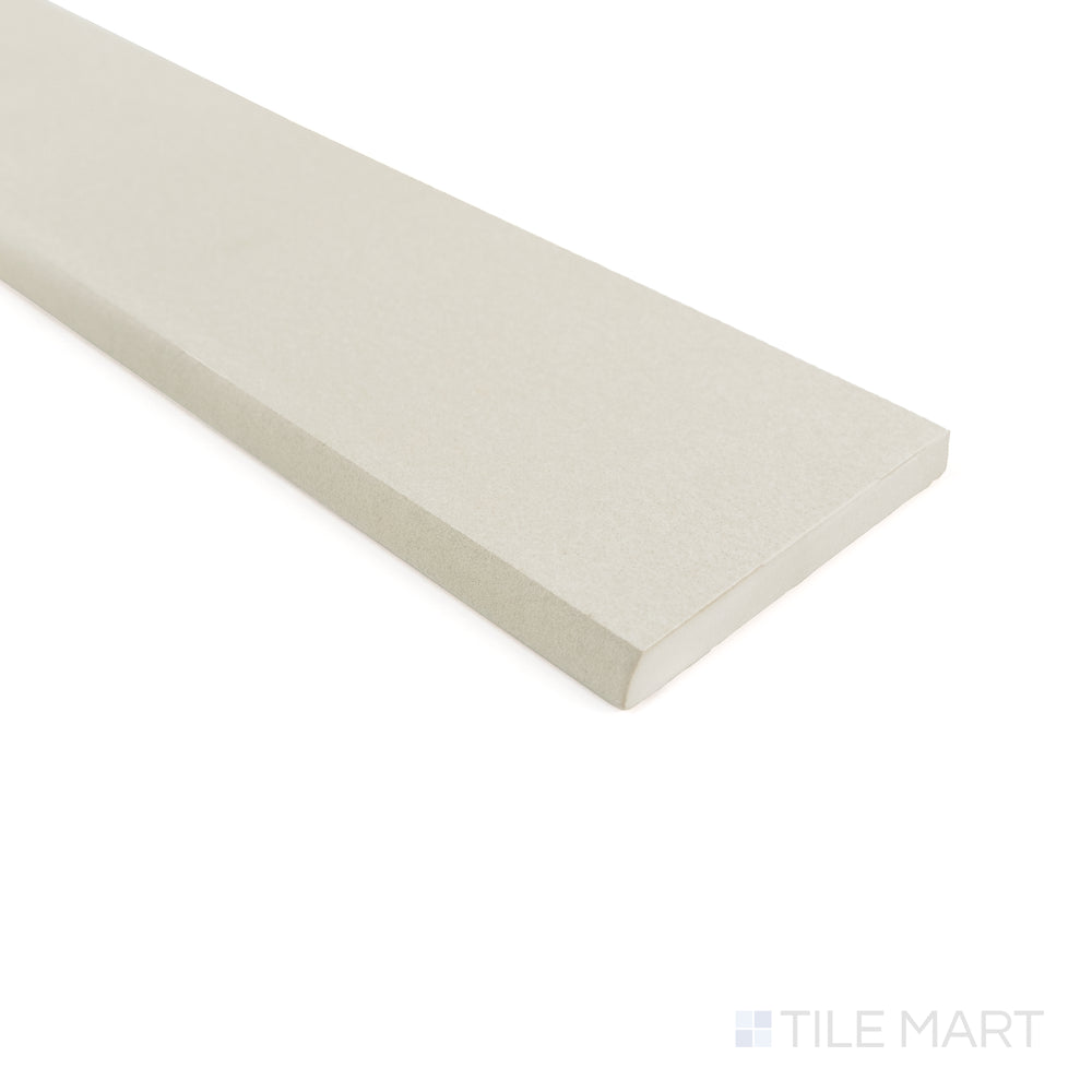 Detailed shot of Sahara White matte porcelain bullnose tile showing its bright surface and smooth contour.