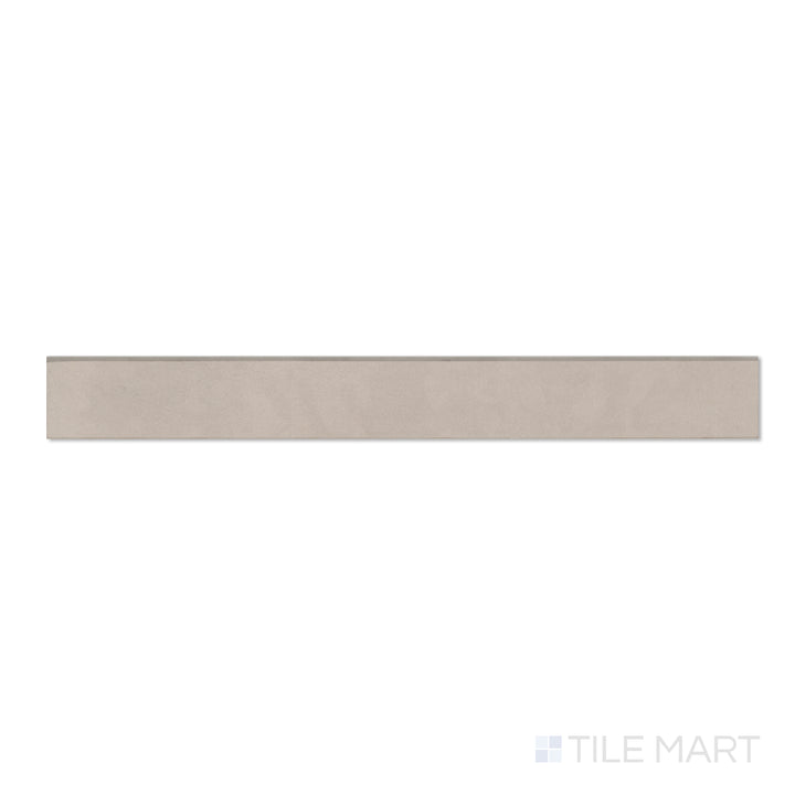 Sahara Grey 3x24 matte porcelain bullnose in top-down perspective, featuring cool grey tones and a subtle curved edge.