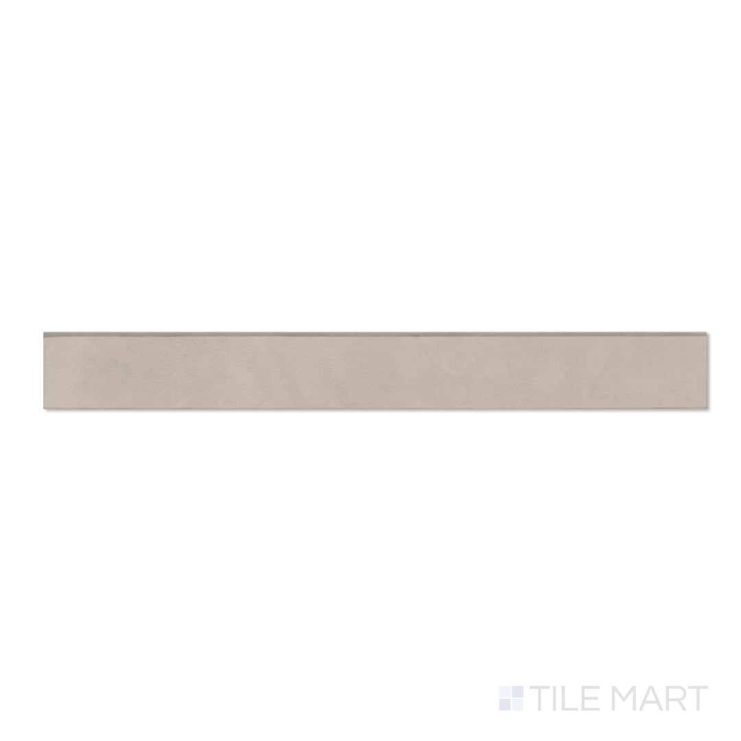 Sahara Grey 3x24 matte porcelain bullnose in top-down perspective, featuring cool grey tones and a subtle curved edge.