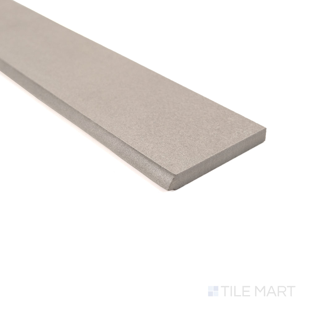 Close-up of Sahara Grey matte porcelain bullnose tile capturing its neutral tone and refined finished edge.