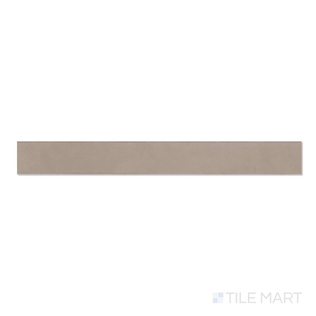 Overhead image of Sahara Taupe 3x24 matte porcelain bullnose, displaying warm taupe coloring and rounded bullnose profile.