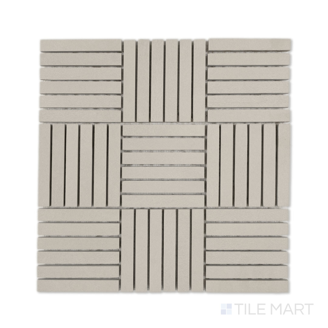 Flat-lay of Sahara Grey 5/8x4 crosshatch matte porcelain mosaic, emphasizing cool grey strips in a precise crosshatch formation.