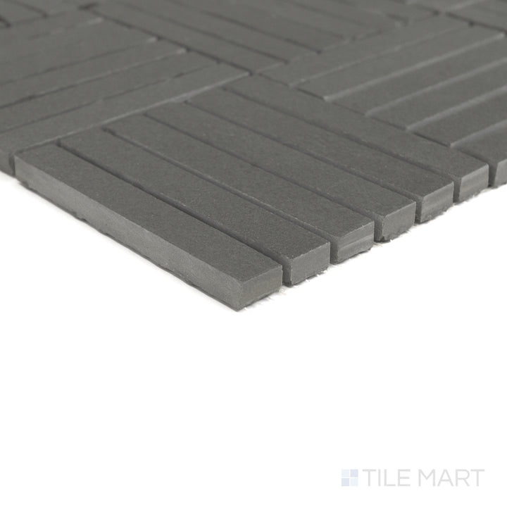 Close-up of Sahara Dark crosshatch matte porcelain mosaic emphasizing its deep tone and intricate crosshatch design.