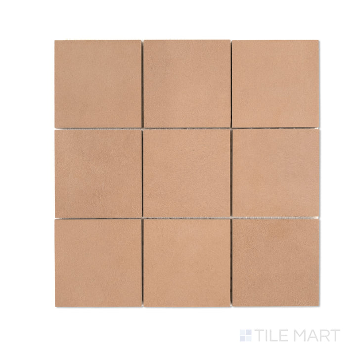 Top-down view of Sahara Cotto 4-inch square matte porcelain mosaic, showcasing rustic terracotta tones in a uniform grid pattern.