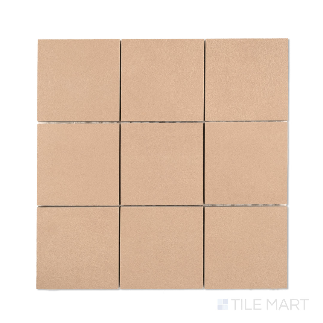 Flat-lay image of Sahara Rose 4-inch square matte porcelain mosaic tiles, featuring soft rosy hues arranged in clean square alignment.