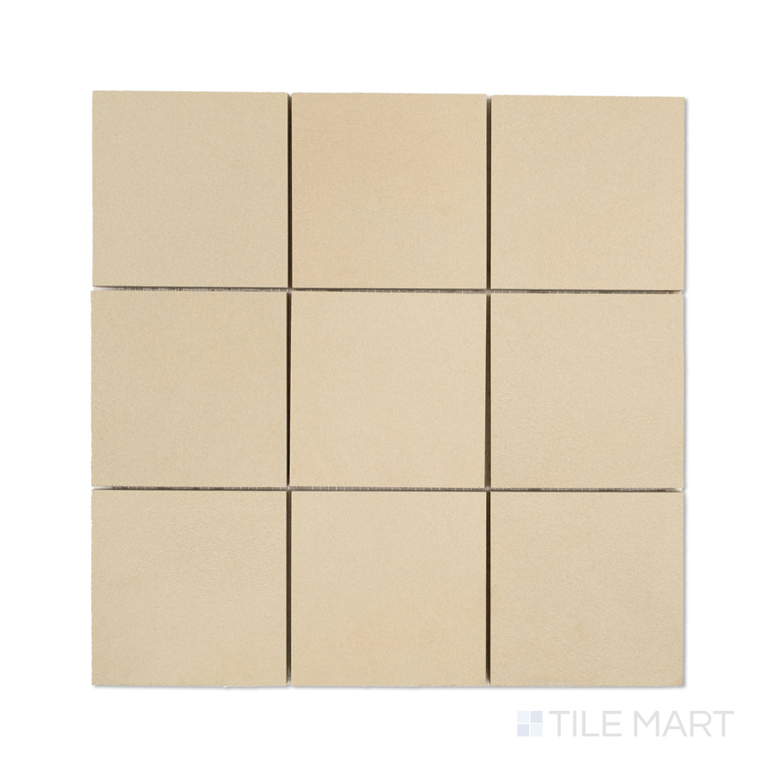 Overhead shot of Sahara Ecru 4-inch square matte porcelain mosaic, displaying warm beige tones in a symmetrical square tile layout.