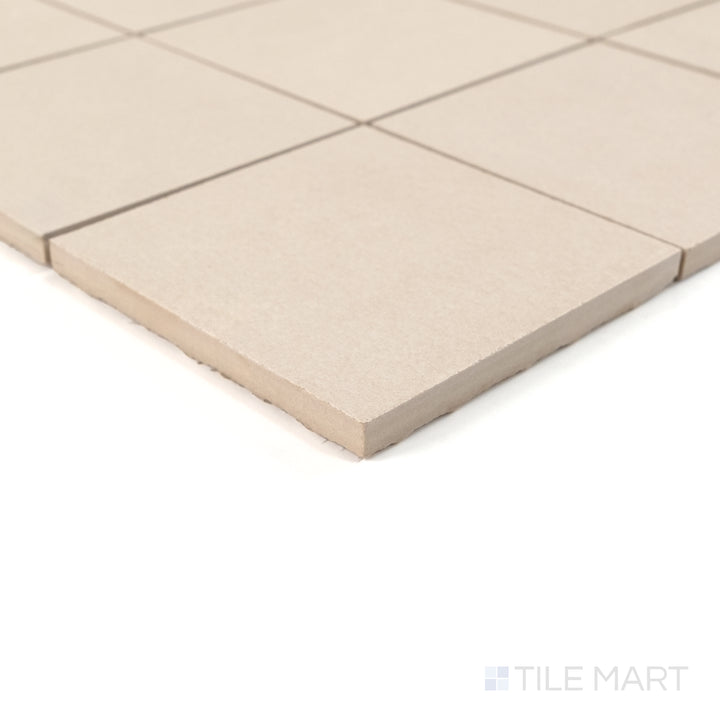 Corner close-up of Sahara White 4" square matte porcelain mosaic showing its clean edge and smooth matte finish.