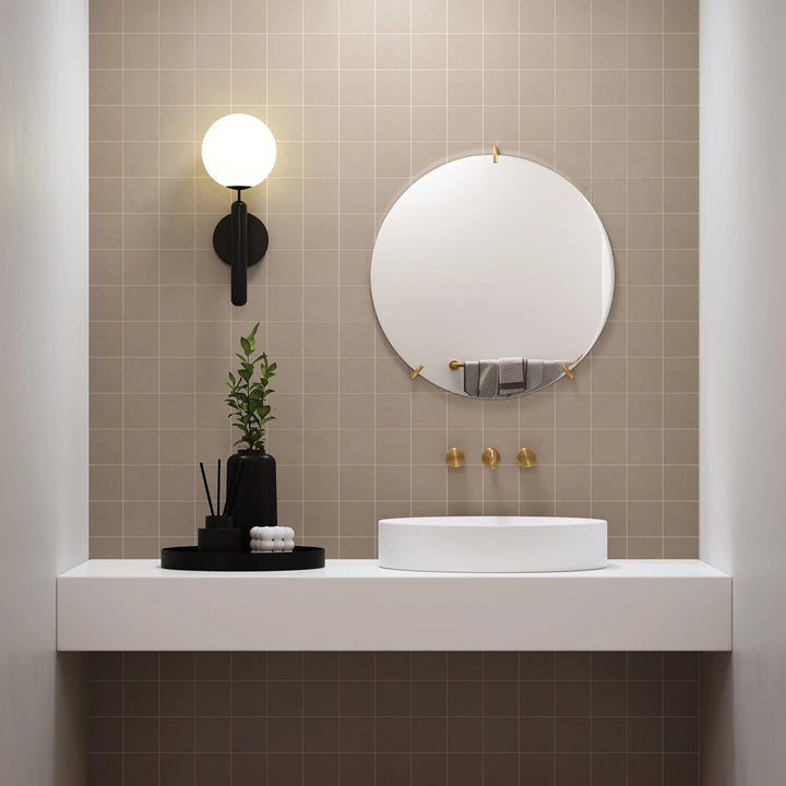 Sahara Taupe 4" square matte porcelain mosaic featured in a neutral-toned, modern lifestyle setting.