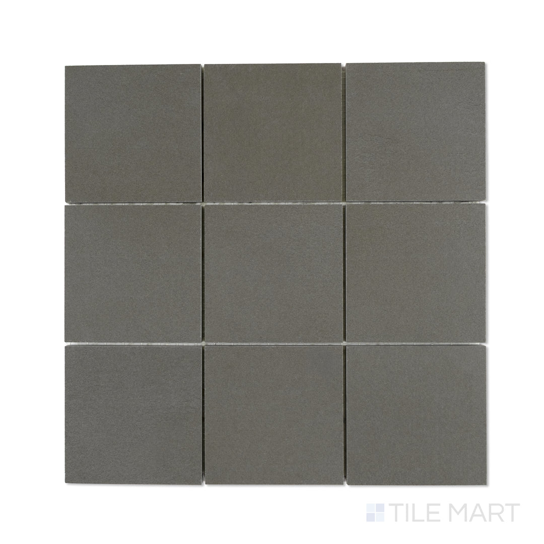 Top-down image of Sahara Dark 4-inch square matte porcelain mosaic, featuring rich dark tones in an even square tile arrangement.